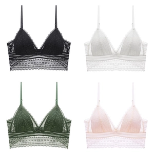 Detail of four colorful lace bralettes with delicate eyelash trim and triangle cups