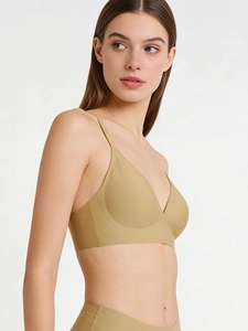Close-up of seamless nude wireless bra showing smooth texture and adjustable straps