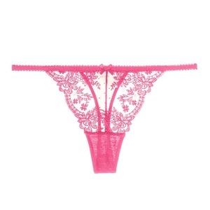 Close-up of pink lace thong featuring delicate floral patterns and a small satin bow detail