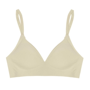 Close-up of seamless deep V-neck beige bra with adjustable thin shoulder straps