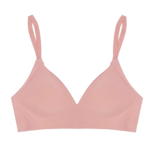 Close-up of seamless pink bra showing high-elasticity fabric and deep V-neckline