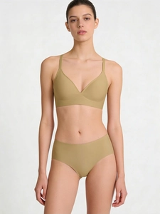 Detail view of seamless beige lingerie set with V-neck wireless bra and comfy panties