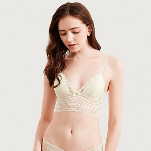 Detailed view of floral lace bralette with delicate bow and wide sheer lace underband