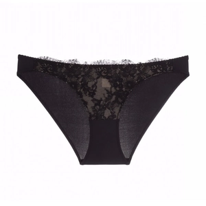 Close-up of black low-rise lace panties featuring delicate floral embroidery and silk fabric