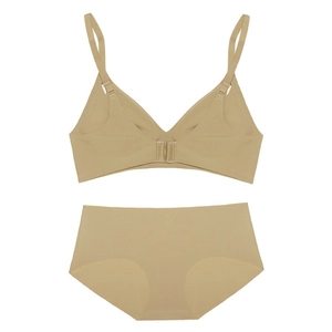Detail view of seamless beige lingerie set including v-neck bra and smooth panties
