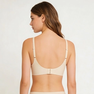Seamless beige wireless push-up bra with U-shaped back and thin adjustable straps