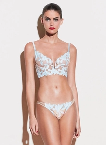 Detailed view of light blue lace lingerie set with floral embroidery and mesh texture