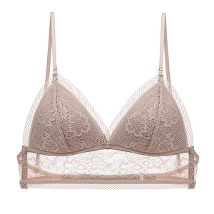 Detailed view of apricot French lace triangle bralette with adjustable straps and wide lace band