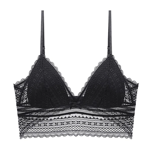 Macro shot of black lace triangle bralette with wireless design and floral details