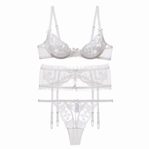 Three-piece white floral lace lingerie set with bra, garter belt, and matching thong