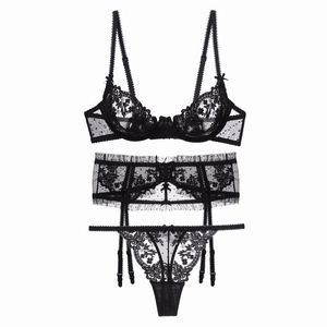 Three-piece black floral lace lingerie set with underwire bra, garter belt and thong