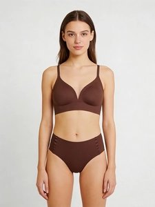 Detail view of seamless deep V-neck wireless bra and high-waisted briefs in chocolate brown