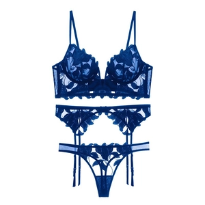 Three-piece deep blue lace lingerie set with floral embroidery and garter belt