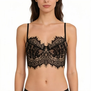 Detailed view of black eyelash lace bra with underwire support and sheer floral patterns