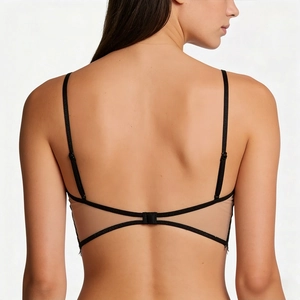 Detailed back view of lace bra with slim black contrast straps and single hook closure