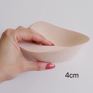 Macro detail of 4cm thick breathable foam padding insert for push-up bras and swimwear