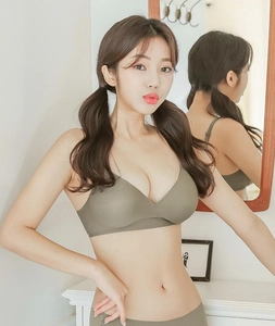 Olive green seamless lingerie set featuring a V-neck bra and matching panties on a model