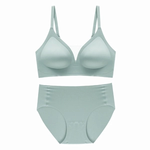 Detail view of mint green seamless lingerie set with V-neck mesh and soft fabric