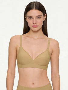 Detail of khaki seamless bra featuring soft support and smooth elastic fabric texture