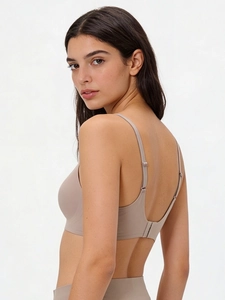 Deep coffee seamless wire-free bra featuring a low U-shaped back and thin straps