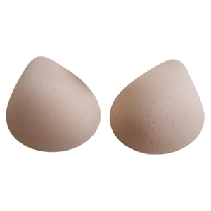 Pair of beige teardrop bra pads with breathable texture for push-up support