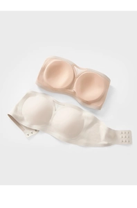Détail de soutiens-gorge bandeau sans couture beige et crème avec larges ailes et agrafes dorsales