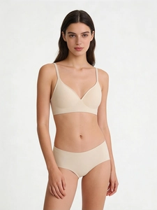 Detail view of seamless beige jelly bra set with smooth silk-like texture for women