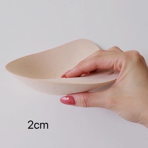 Detail showing 2cm thickness of breathable seamless bra padding for lift and support