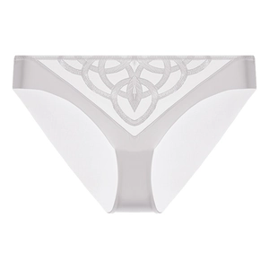 Detailed view of high-cut white silk briefs featuring intricate geometric lace embroidery