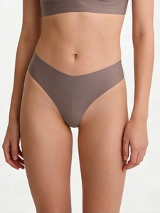 Mocha brown seamless V-cut thong for women shown on model with smooth fabric detail