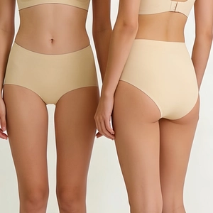 Detail showing high-waisted seamless panties with laser-cut edges and tummy control