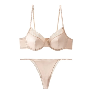 Lace-trimmed underwire bra and thong set in nude satin finish, bohemian style