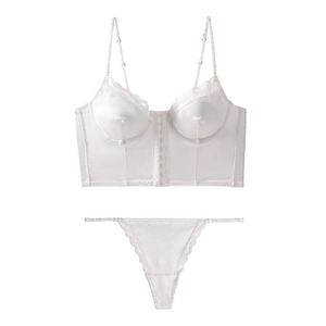 Detail of white satin and lace corset lingerie set with front hooks and thin straps