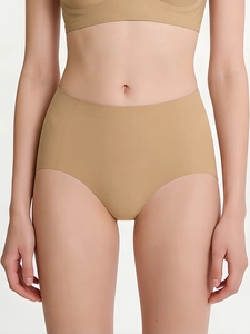 Close-up of high-waist seamless camel underwear showing smooth elastic fabric texture