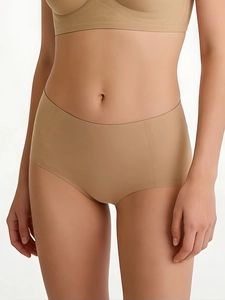 Detail of high-waist seamless nude lingerie set with elastic breathable fabric