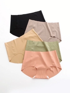 Flat lay detail showing five colors of high-waist seamless panties with elastic cotton crotch