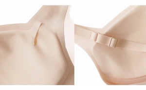 Detail of skin tone seamless bra showing cup inserts and adjustable shoulder straps