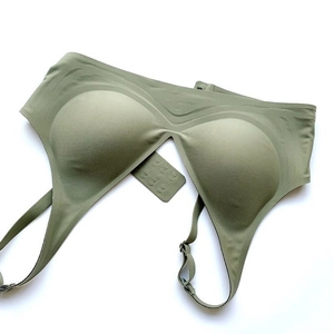 Detailed back view of olive green seamless bra showing adjustable straps and hook closure