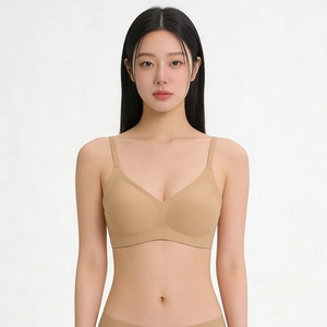 Seamless V-neck bralette for women with adjustable straps in a beige skin tone