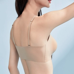 Minimalist seamless nude bralette with adjustable thin straps and smooth back design