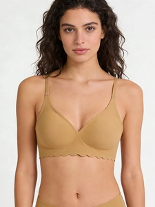 Detail of seamless bra featuring wave-edge hem and soft jelly strip support