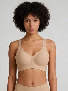 Detailed view of seamless nude bra with wide straps and jelly support structure