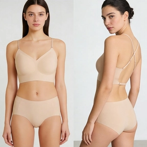 Seamless beige wireless bra and panty set with thin criss-cross back straps design