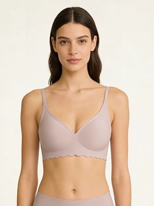 Detail showing seamless wavy edges and soft jelly strip support on women's V-neck bra