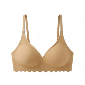 Seamless wireless bra in beige with wave-cut edges and adjustable thin straps