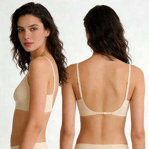 Detail of seamless wireless bra with cross back straps and soft jelly support in beige