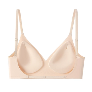 Detailed view of nude wireless bra showing seamless edges and removable drop-shaped padding