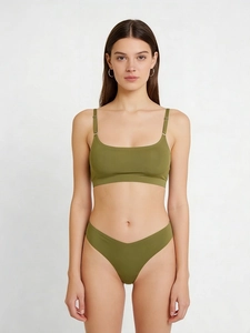 Detailed macro view of olive green seamless ultra-thin lingerie set with adjustable straps