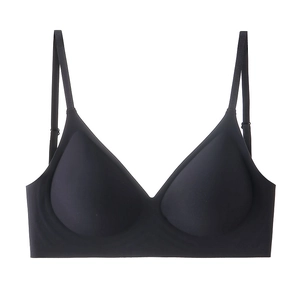 Detail of a black seamless wireless bra featuring thin adjustable straps and soft support