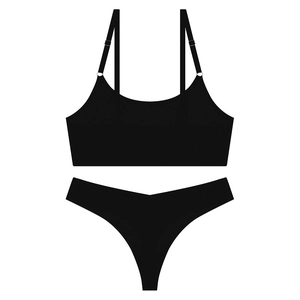 Detail of ultra-thin seamless black lingerie set with adjustable straps and V-cut thong
